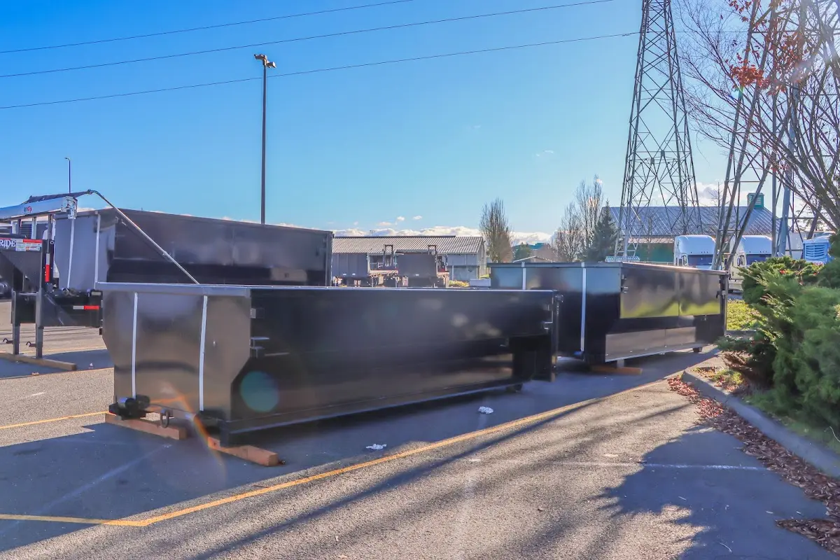 Roll-off dumpster ready for waste disposal at job site for Commercial Dumpster Rental in Albertville